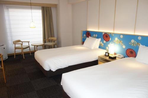 Imagen de la habitación del Hotel Noku Kyoto. Foto 9