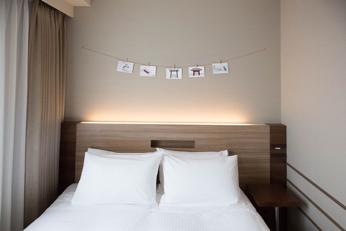 Imagen de la habitación del Hotel Noku Osaka. Foto 8