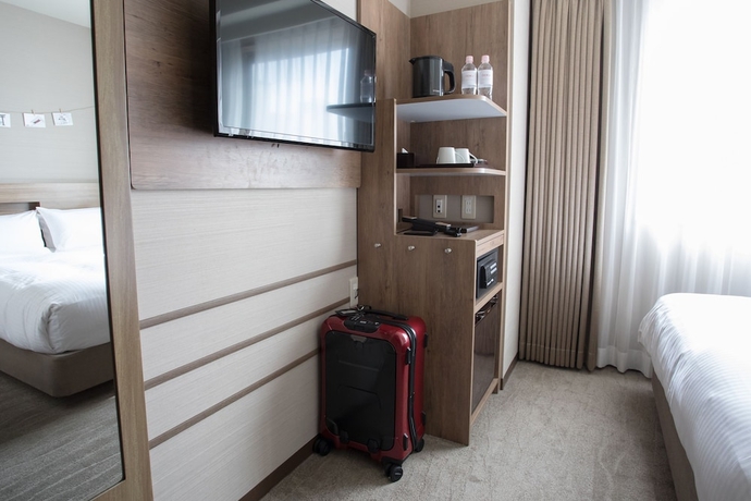 Imagen de la habitación del Hotel Noku Osaka. Foto 11