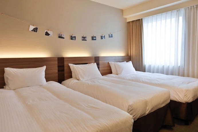 Imagen de la habitación del Hotel Noku Osaka. Foto 14