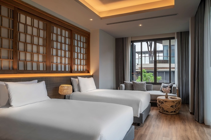 Imagen de la habitación del Hotel Noku Phuket. Foto 13