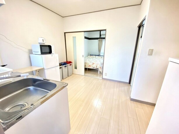 Imagen de la habitación del Hotel Nomad Kotobuki Apartment. Foto 20
