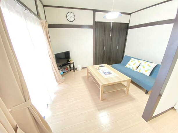 Imagen de la habitación del Hotel Nomad Kotobuki Apartment. Foto 21