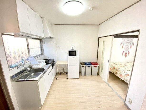 Imagen de la habitación del Hotel Nomad Kotobuki Apartment. Foto 26