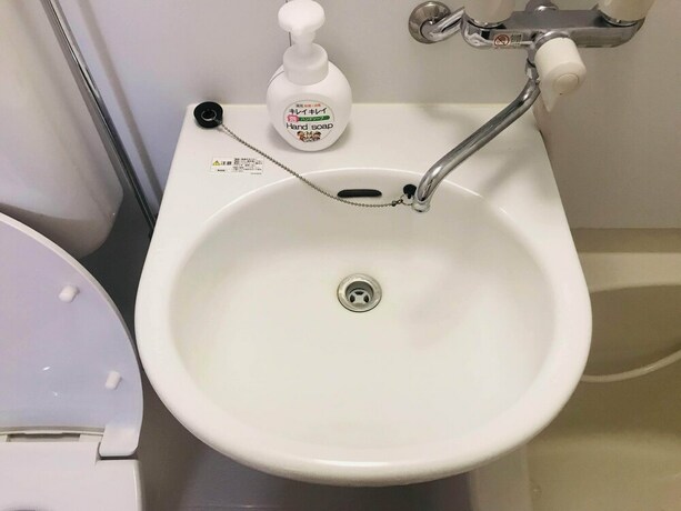 Imagen de la habitación del Hotel Nomad Kotobuki Apartment. Foto 28