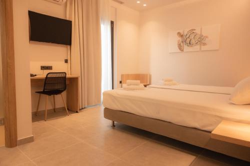 Imagen de la habitación del Hotel Nomad Paralia. Foto 17