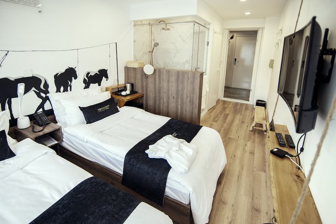 Imagen de la habitación del Hotel Nomado Boutique. Foto 4
