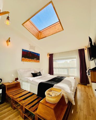 Imagen de la habitación del Hotel Nomado Boutique. Foto 17