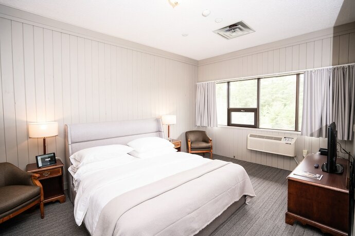 Imagen de la habitación del Hotel Nomi Resort. Foto 16