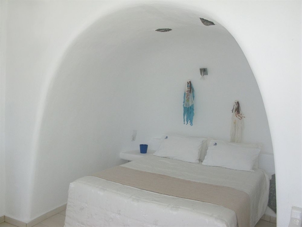 Imagen de la habitación del Hotel Nomikos Villas. Foto 4