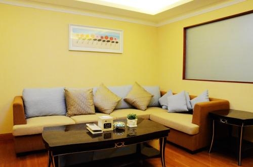 Imagen de la habitación del Hotel Nomo Service Apartment The Legend, Guangzhou. Foto 7