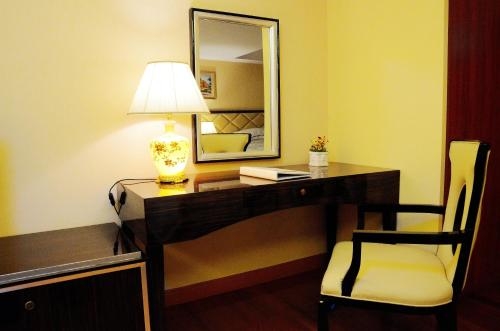 Imagen de la habitación del Hotel Nomo Service Apartment The Legend, Guangzhou. Foto 9