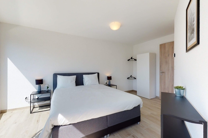 Imagen de la habitación del Hotel Nonanteneuf Aigle. Foto 17