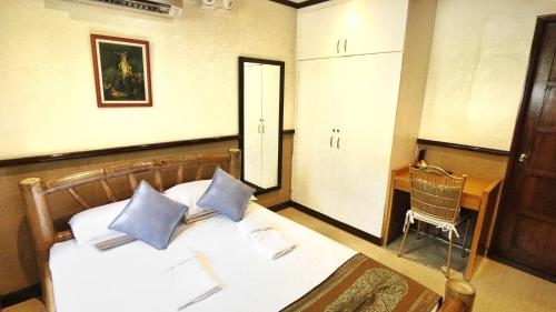 Imagen de la habitación del Hotel Noni's Resort. Foto 6
