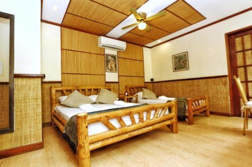 Imagen de la habitación del Hotel Noni's Resort. Foto 7