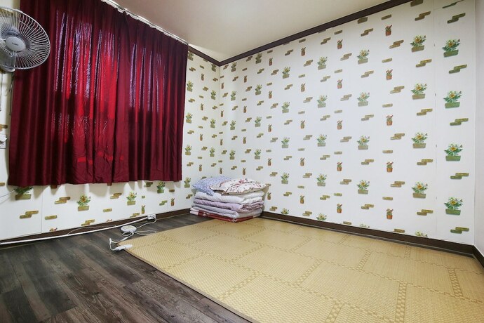 Imagen de la habitación del Hotel Nonsan Hwangje Motel. Foto 11