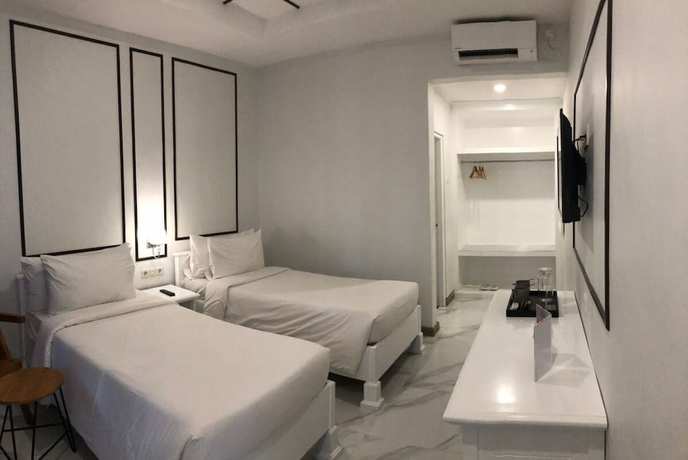 Imagen de la habitación del Hotel Noola Malioboro. Foto 9