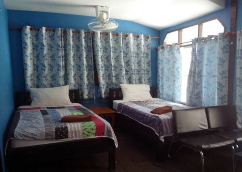 Imagen de la habitación del Hotel Noom Guesthouse. Foto 6