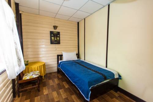 Imagen de la habitación del Hotel Noom Guesthouse. Foto 7