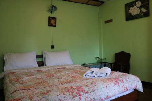 Imagen de la habitación del Hotel Noom Guesthouse. Foto 11