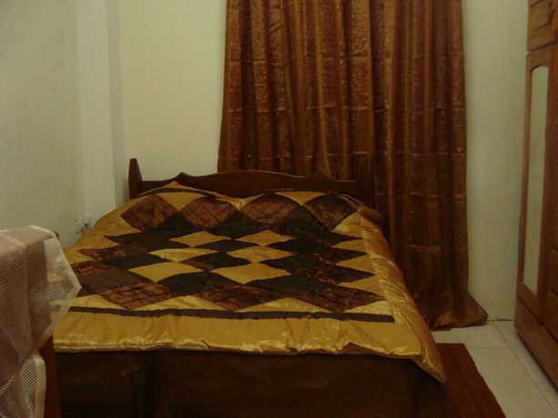Imagen de la habitación del Hotel Noon's Visitor's Accommodation. Foto 4