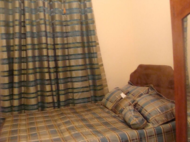 Imagen de la habitación del Hotel Noon's Visitor's Accommodation. Foto 5