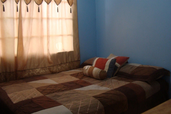 Imagen de la habitación del Hotel Noon's Visitor's Accommodation. Foto 9