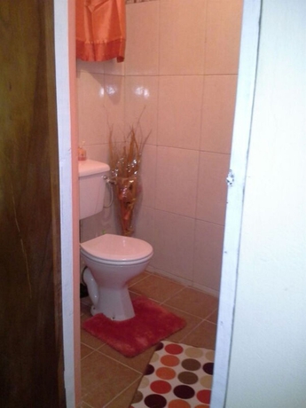 Imagen de la habitación del Hotel Noon's Visitor's Accommodation. Foto 12