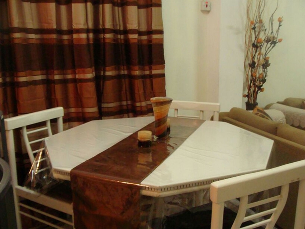 Imagen de la habitación del Hotel Noon's Visitor's Accommodation. Foto 14