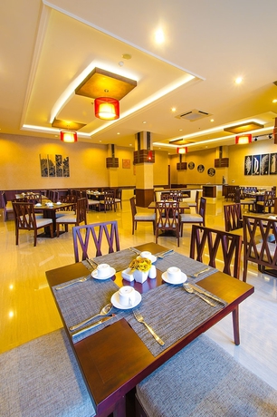 Imagen del bar/restaurante del Hotel Noormans Semarang. Foto 2