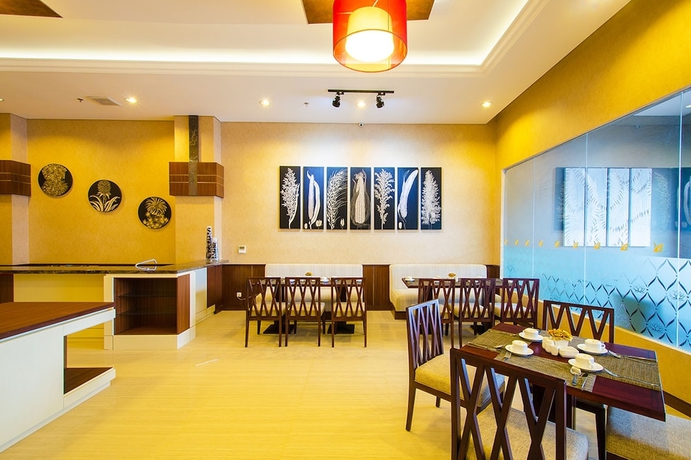 Imagen del bar/restaurante del Hotel Noormans Semarang. Foto 7