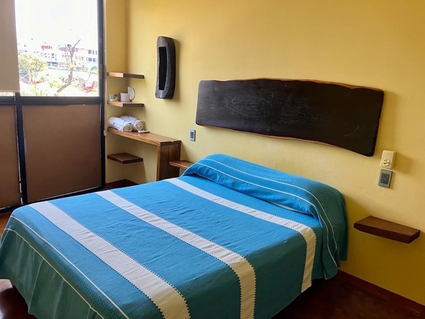 Imagen de la habitación del Hotel Nopalero Suites Hostel. Foto 2