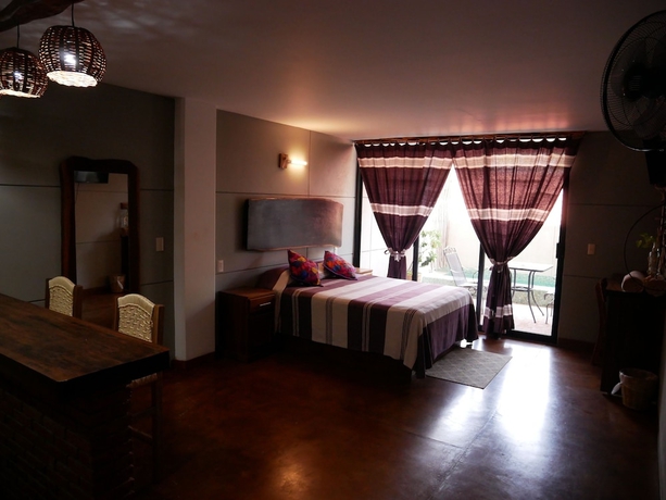 Imagen de la habitación del Hotel Nopalero Suites Hostel. Foto 7