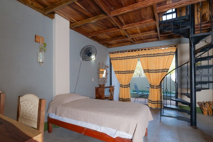 Imagen de la habitación del Hotel Nopalero Suites Hostel. Foto 8
