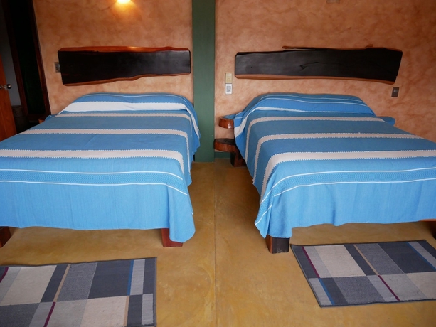 Imagen de la habitación del Hotel Nopalero Suites Hostel. Foto 11