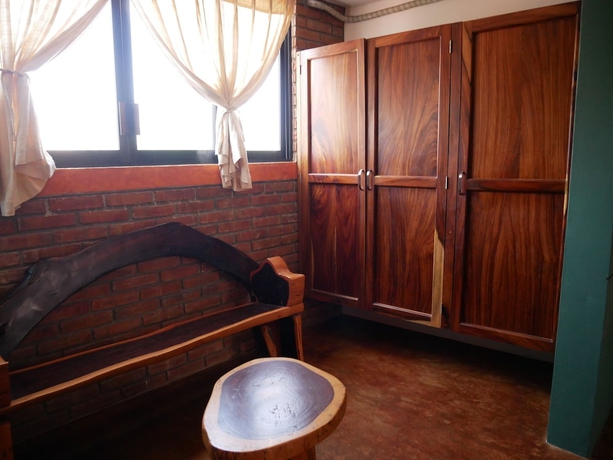 Imagen de la habitación del Hotel Nopalero Suites Hostel. Foto 12