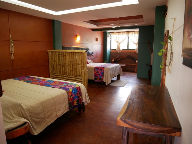 Imagen de la habitación del Hotel Nopalero Suites Hostel. Foto 13
