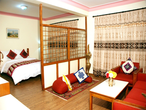 Imagen de la habitación del Hotel Norbulinka Boutique. Foto 9