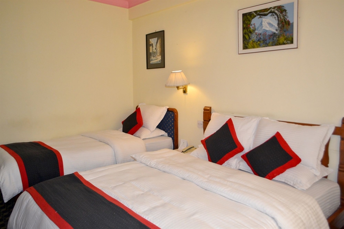 Imagen de la habitación del Hotel Norbulinka Boutique. Foto 10