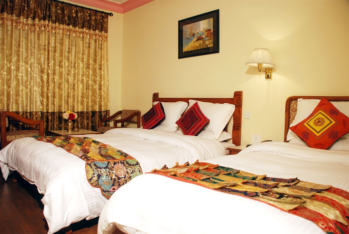 Imagen de la habitación del Hotel Norbulinka Boutique. Foto 11