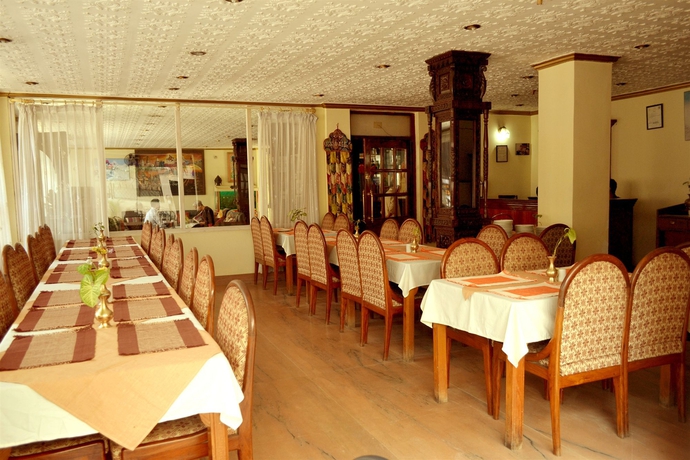 Imagen del bar/restaurante del Hotel Norbulinka Boutique. Foto 4