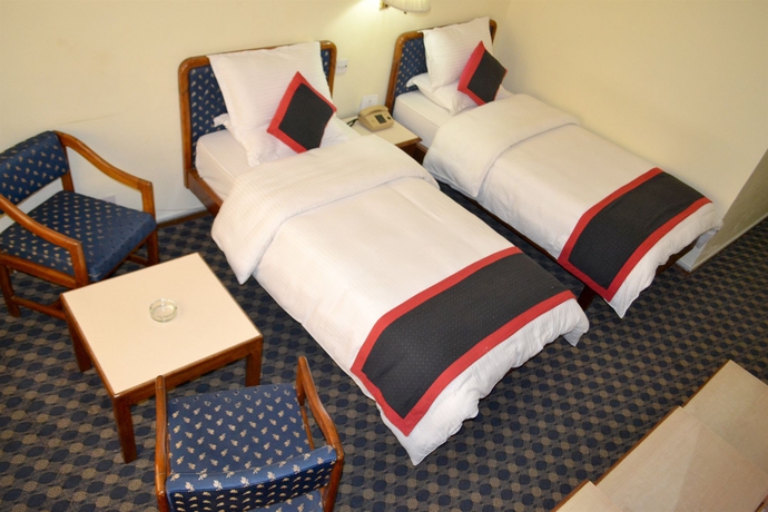 Imagen de la habitación del Hotel Norbulinka Boutique. Foto 12
