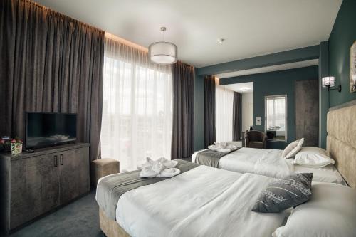 Imagen de la habitación del Hotel Nordic Twins. Foto 16