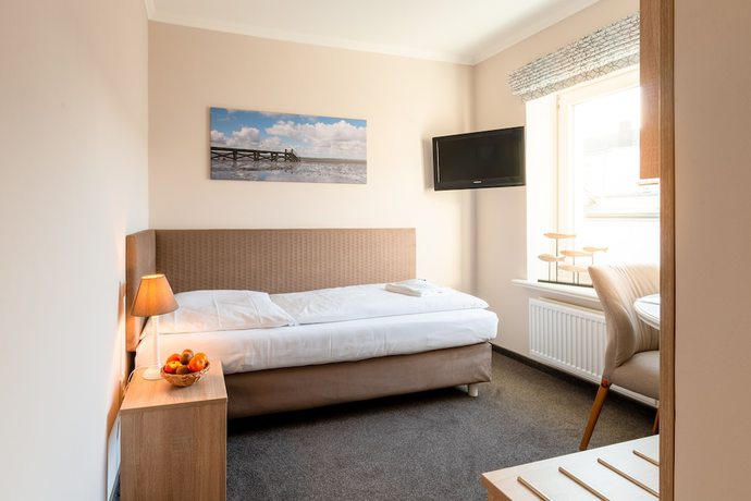Imagen de la habitación del Hotel Nordsee-Hinrichsen. Foto 19
