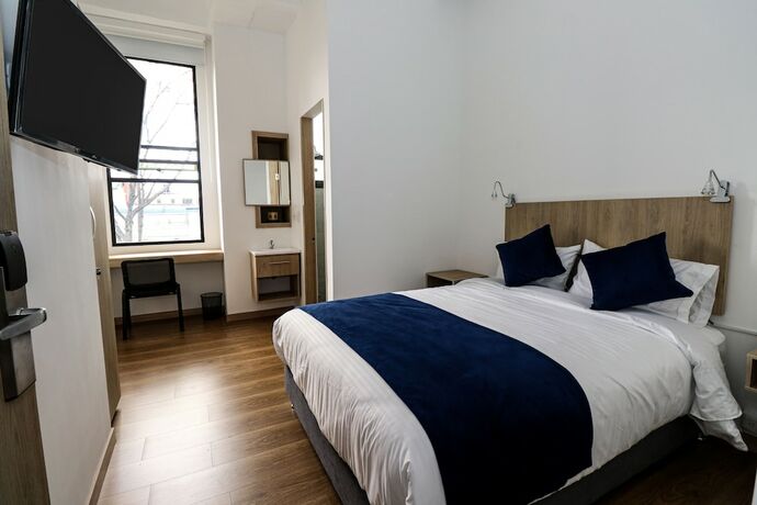 Imagen de la habitación del Hotel Normand&iacute;a Tower. Foto 14