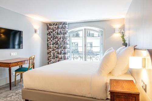 Imagen de la habitación del Hotel Normandy Paris - Saint-Honor&eacute;. Foto 20