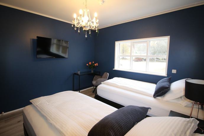 Imagen de la habitación del Hotel North. Foto 11