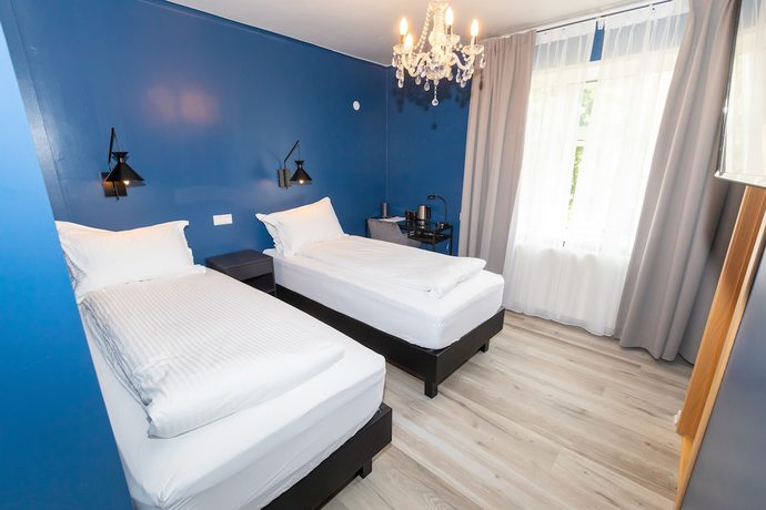 Imagen de la habitación del Hotel North. Foto 12