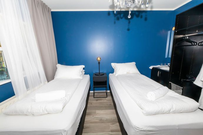 Imagen de la habitación del Hotel North. Foto 13