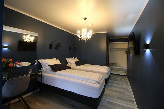 Imagen de la habitación del Hotel North. Foto 16